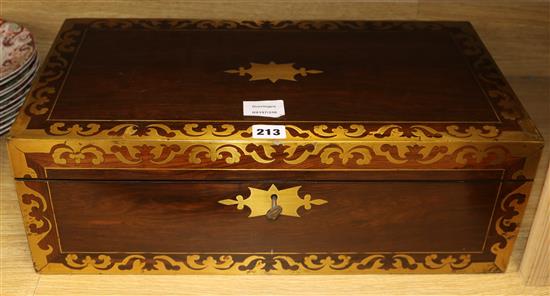 A Regency rosewood and brass inlaid rectangular writing box, with lifting top enclosing a fitted interior, width 50cm. (a.f.)